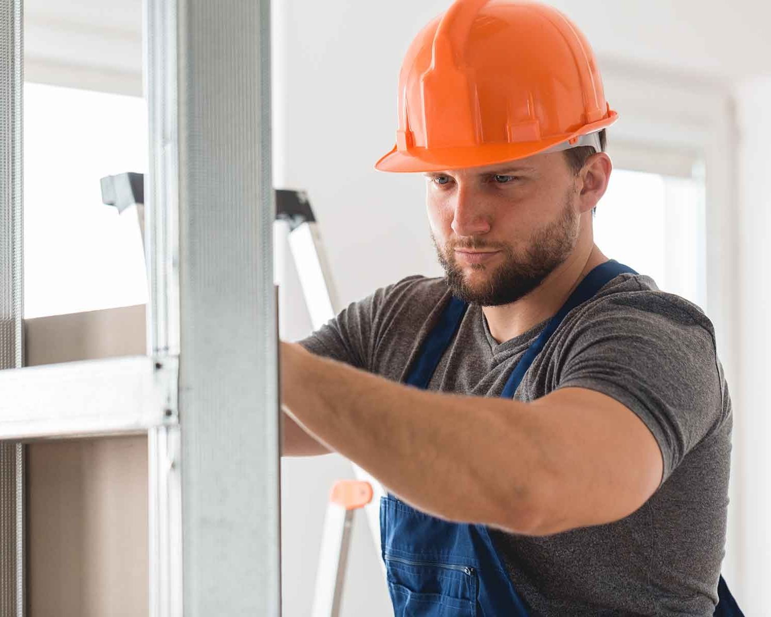 imgi_89_man-building-a-wall-NJRQWLC